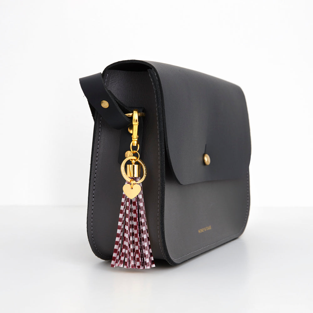 Firefly Reflectors - Burgundy Checker Print Tassel Reflector