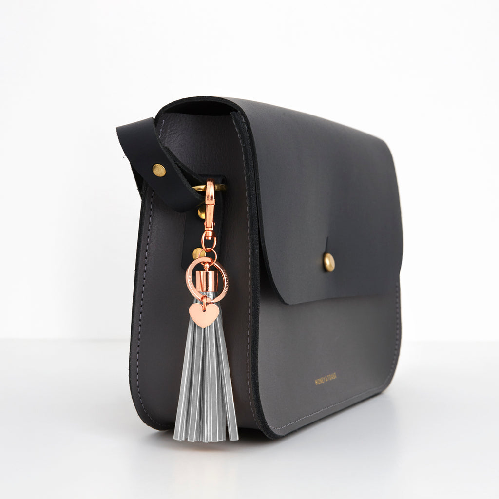 Firefly Reflectors - Grey Sky Rosé Tassel Reflector Bag Charm