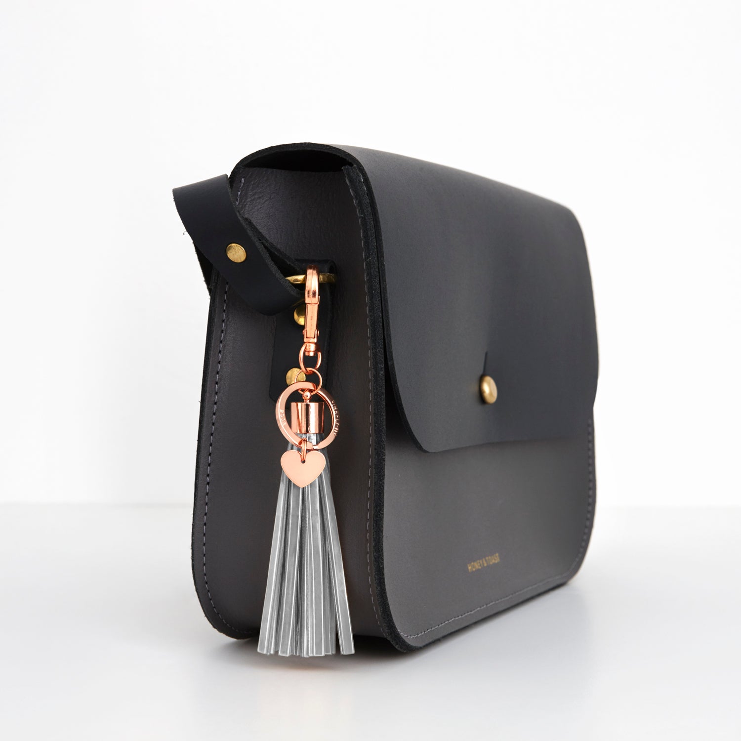 Firefly Reflectors - Grey Sky Rosé Tassel Reflector Bag Charm